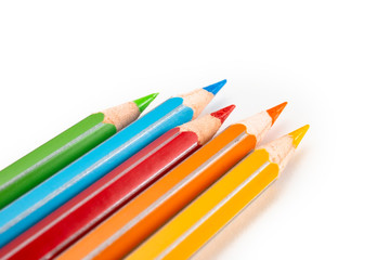 Fototapeta premium Colored pencils isolated on white. Macro still-file picture made in studio with softbox.