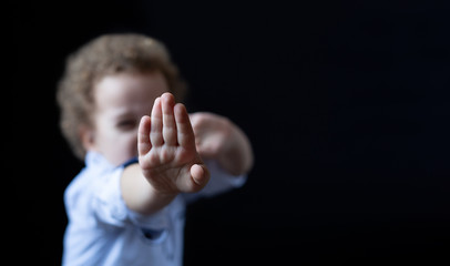 Child in a defense against child violence.
