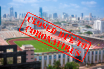 Defocused view of stadium or sports arena, empty and closed due to coronavirus