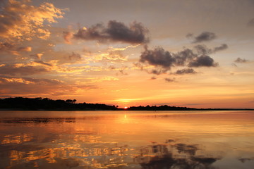 Fototapeta premium sunset over the river