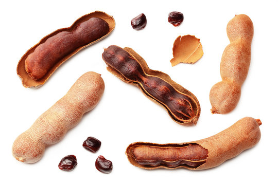 fresh tamarind fruits isolated on white background. top view