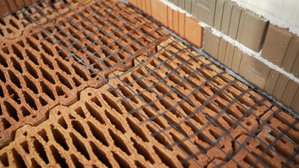 Isolated pile of builders bricks. Ceramic blocks stack