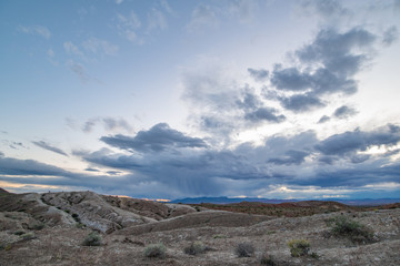 Rain above Gypsum Hills in Gold Butte National Monument, Clark County, NV, USA