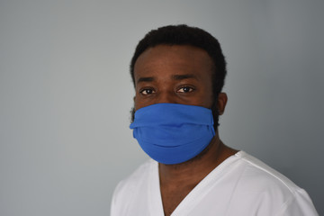 Black african american man doctor  in medical mask. Coronavirus is around. People who saves themselves. Pandemic. 
