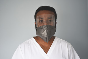 Black african american man doctor  in medical mask. Coronavirus is around. People who saves themselves. Pandemic. 