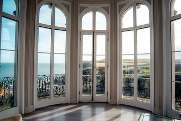 Beautiful observatory with windows overlooking ocean and mountains