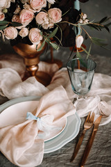 Special silk ribbon focus view on the place perfect for table decoration. Best light peach pastel color motif for wedding. Props for table photography. Use by fashion designer.