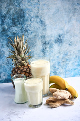 White smoothie with banana, pineapple and ginger