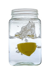 splashes in a can with water close up isolated on white background