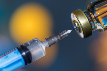 Close up vaccine vial dose flu shot drug needle syringe, medical concept vaccination hypodermic injection treatment, disease care hospital prevention, immunization illness