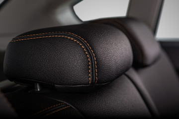 the interior of the car is covered with handmade genuine leather. the headrest of the rear bench seat