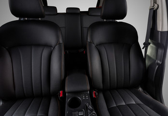 the interior of the car is covered with handmade genuine leather. The General plan of the interior of the car. View from the windshield. The back doors are cut from the photo. High-quality stitching