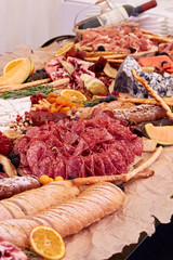 A close up of many different types of apitizers. Italian antipasti wine snacks set.