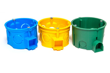 The three junction boxes for wires isolated on white background used in electricity