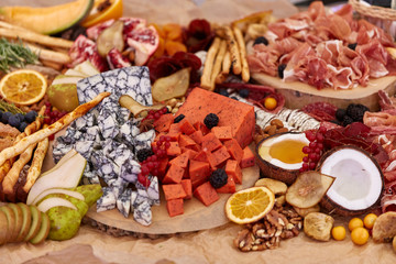 A close up of many different types of apitizers. Italian antipasti wine snacks set.