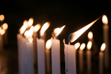 candles lit in a catholic church