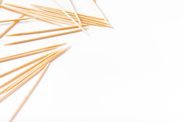 Toothpicks on white background. Free space for writing text.