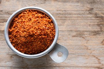 Tajin Seasoning in  Measuring Cup