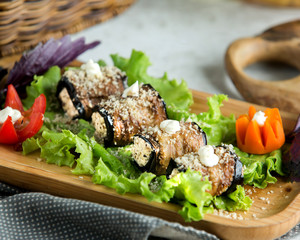 close up of aubergine wraps with cream and walnut mixture