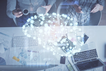 Double exposure of man and woman working together and human brain hologram drawing. Brainstorm concept. Computer background. Top View.