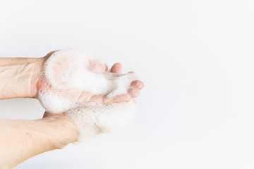 a man hands washing his hands with soap bubble cleaning hands washing off germs virus plain white background
