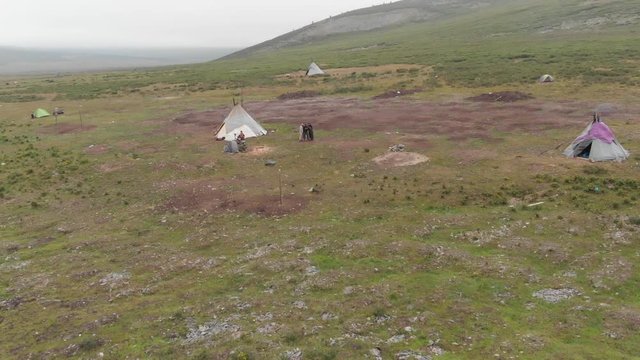 Aerial 360 view of the reindeer herders tents camp, near Tsagaannuur, north Mongolia