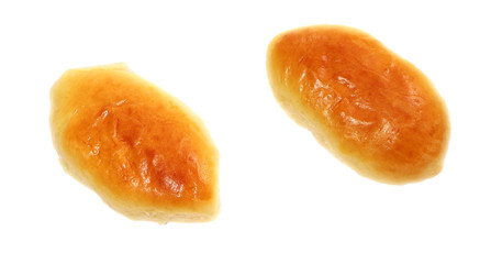 Sweet pie isolated. Baked bun on a linen fabric. Baked rolls. Mince pie.