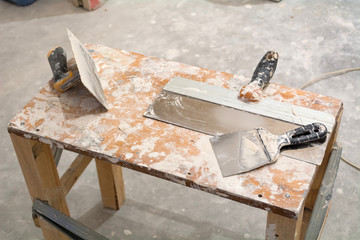 Instruments for renovation apartment. Chisel, trowel, putty knife.