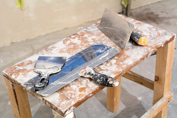 Instruments for renovation apartment. Chisel, trowel, putty knife.