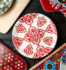 top view of plate with ornaments in red