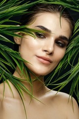 Naklejka premium beautiful woman green leaves charm luxury