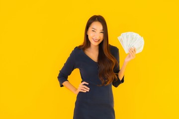 Portrait beautiful young asian woman with money and cash