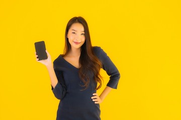 Portrait beautiful young asian woman with phone