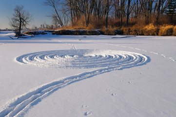 Footprint snow ring on a frozen river in winter at the Toronto Islands