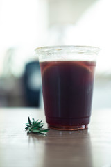 Ice long black coffee on table