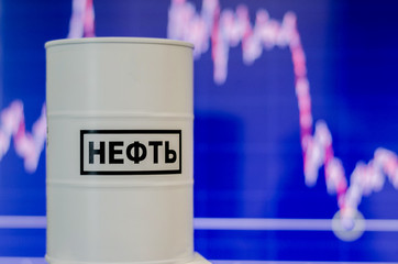 Falling oil prices. Barrel with the words oil in Russian, located on the background of a graph of...