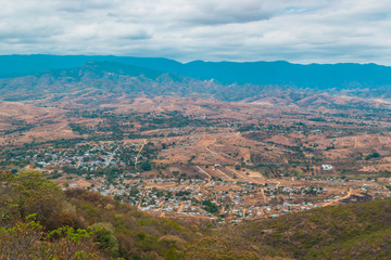 Fototapeta na wymiar Panoramic view of mountains on blue sky