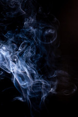 Smoke motion on black background.