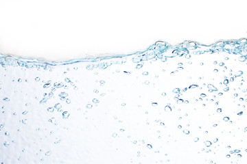 Blue bubbles underwater on white background. - obrazy, fototapety, plakaty
