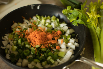 Diced stir fry ingredients in pan