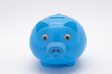 Blue piggy bank or money box isolated on a white background