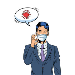 businessman using face mask and covid19 particle in speech bubble
