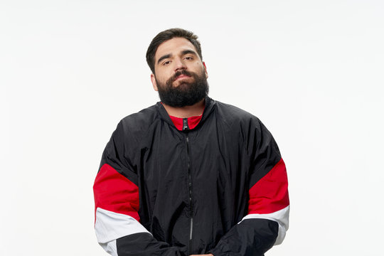 Young Man In A Red Shirt And Black Tie