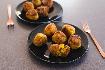 plant-based food, deep fried risotto arancini balls with vegan cheese filling