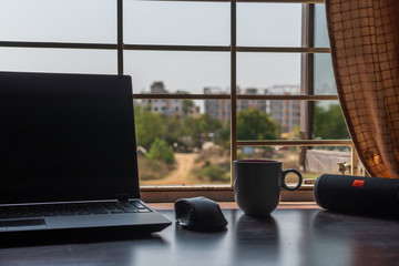 Work from home desk in Indian flat looking over street
