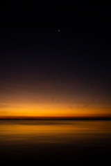 Fototapeta premium The sky with star at the lake in the twilight after sunset.