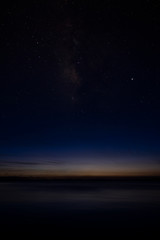 Vertical image of The sky with star at the lake in the twilight sky