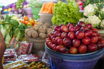 Vegetables on the basket neatly at a market