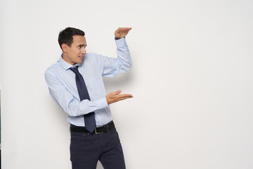 businessman pointing at blank board