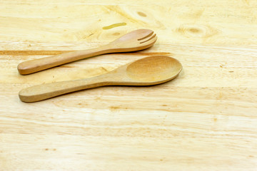 Wooden spoon on wooden background